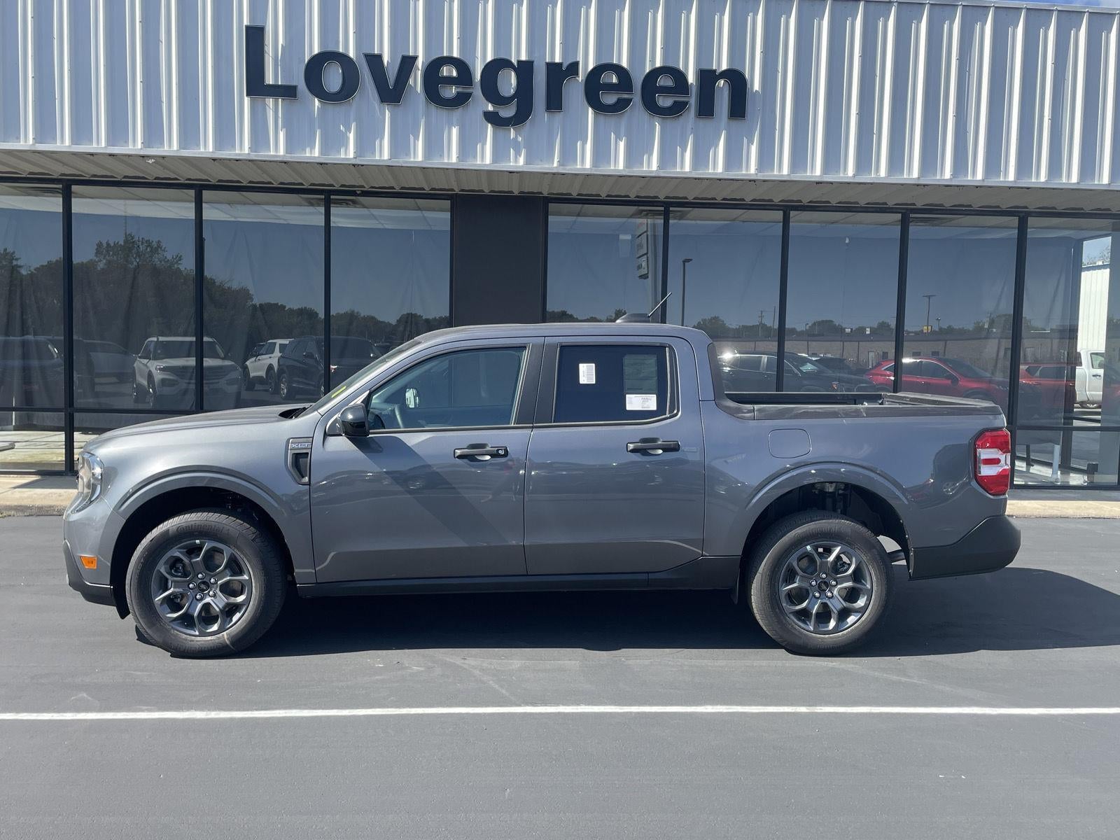 2025 Ford Maverick XLT in Carbonized Gray Metallic — front three-quarter view