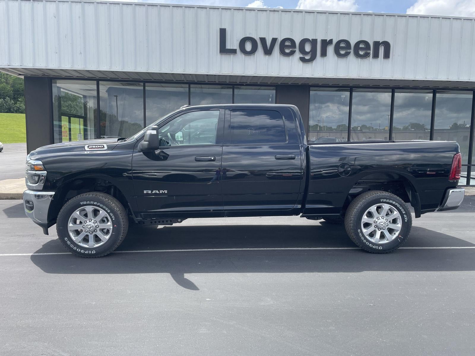 2026 RAM Ram 2500 RAM 2500 BIG HORN CREW CAB 4X4 6'4' BOX in Diamond Black Crystal Pearl-Coat Exterior Paint — front three-quarter view
